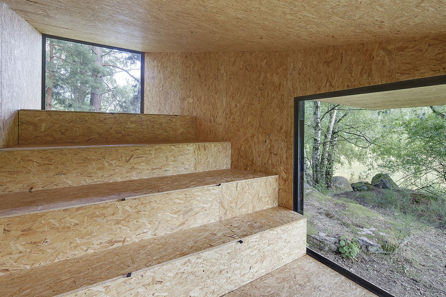 Steps inside the tiny cabin with storage inside