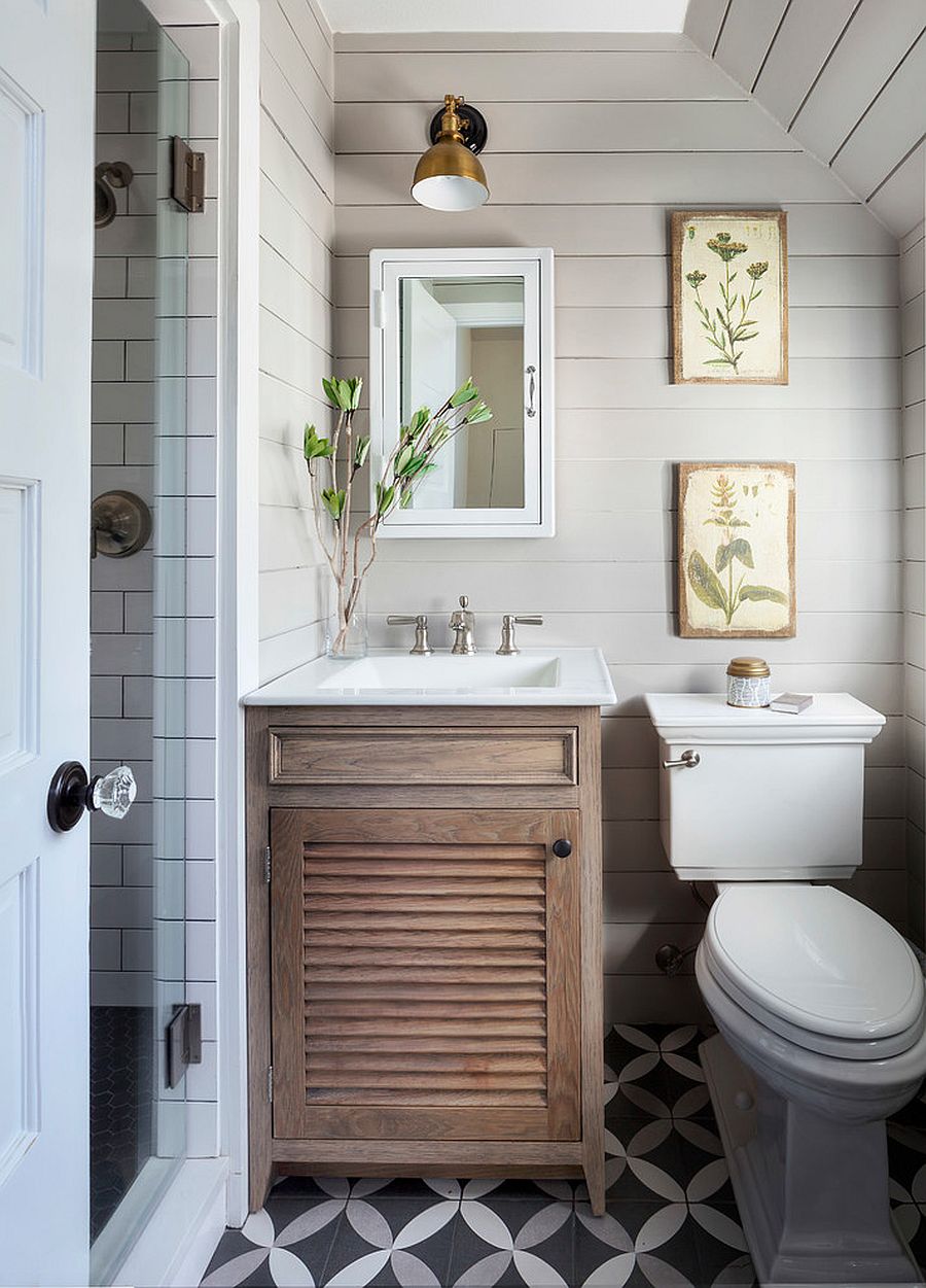 Tiny-bathroom-in-white-with-small-wooden-vanity