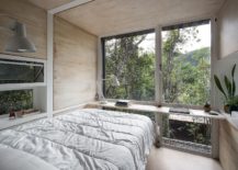 Ultra-tiny-cabin-with-bed-table-and-sink-217x155