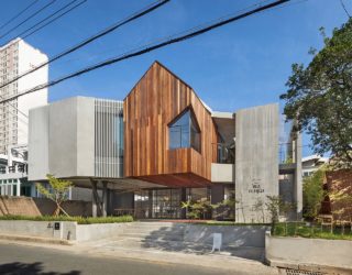 Stylish Café and Sensible Home Rolled into One Unravels Cantilevered Beauty