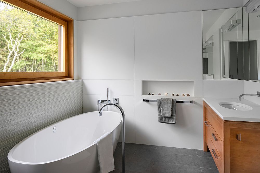 Vanity-and-window-frame-in-wood-for-the-smart-white-bathroom