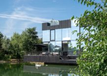 Villa-on-a-Lake-clad-in-glass-217x155