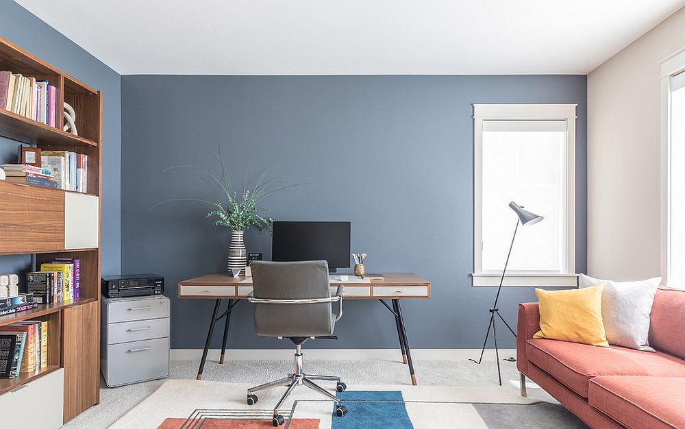 White and bluish gray home office with pops of pink and wooden storage system