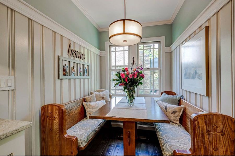 White coupled with wood and pastel green in the small dining room