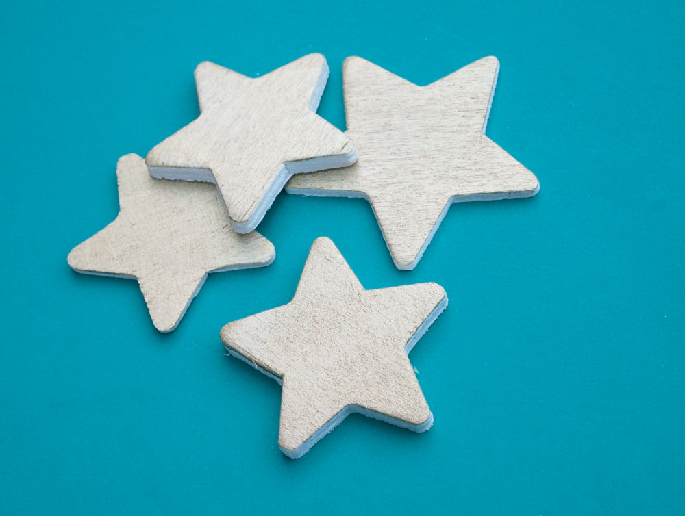 Wooden craft stars painted gold