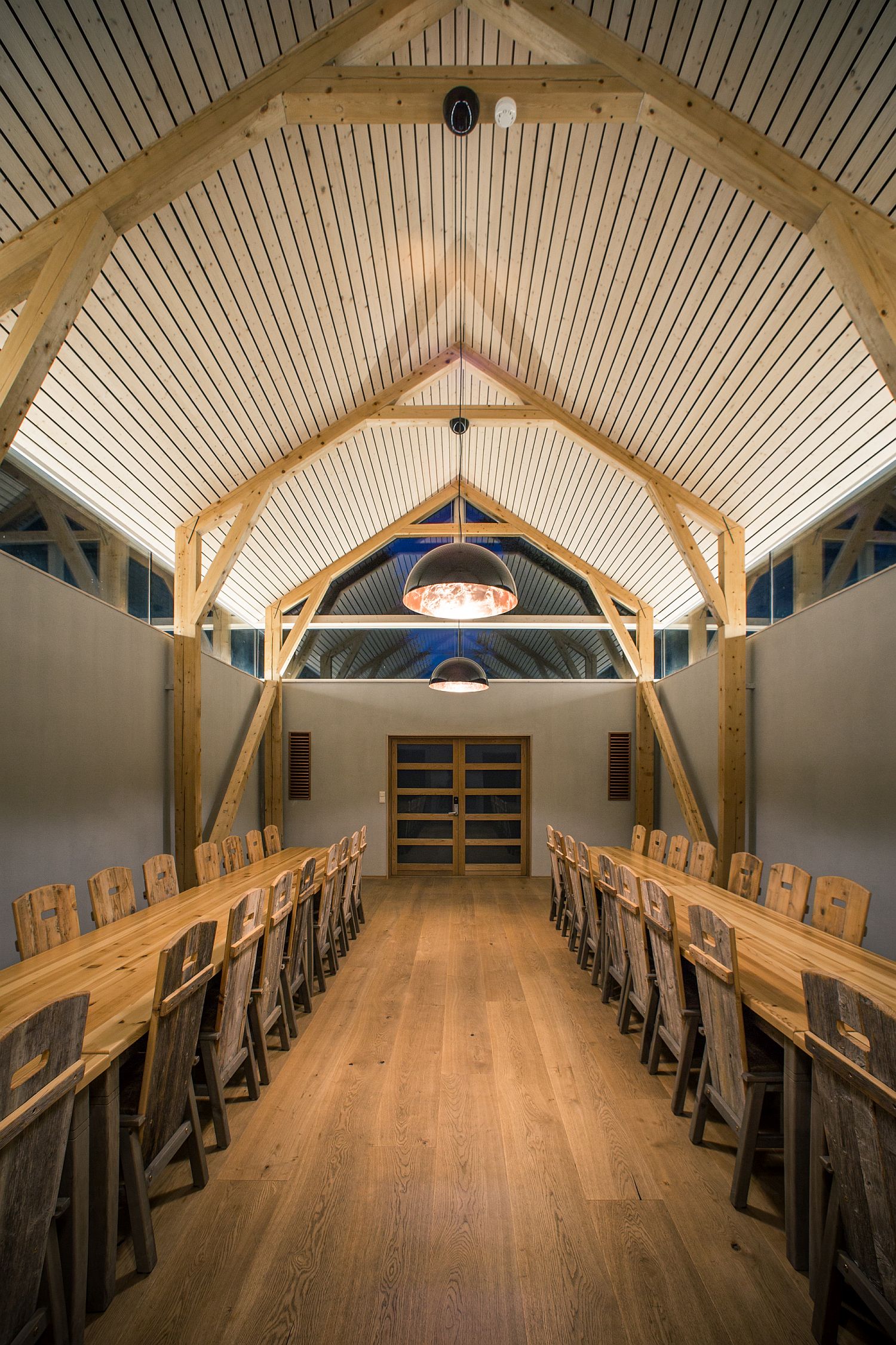 Wooden support beams create the sense of a room within a room