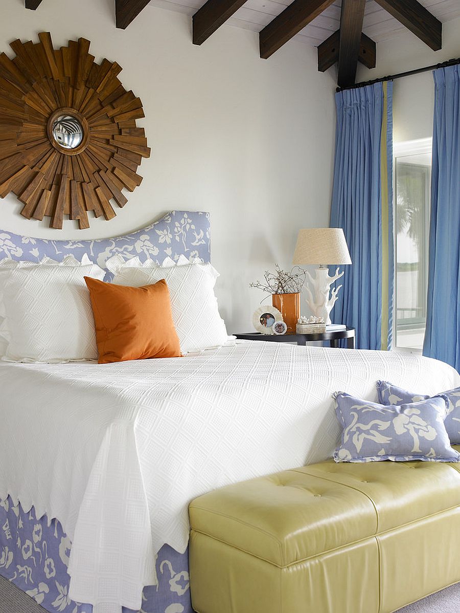 Blue-drapes-add-to-the-appeal-of-the-spacious-beach-style-bedroom