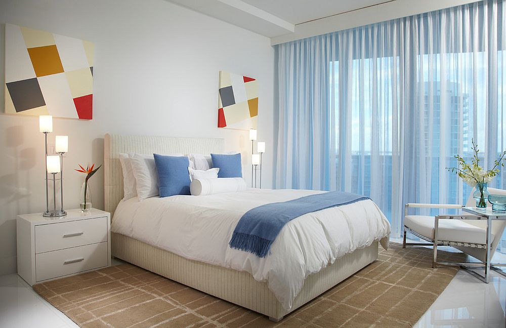 Cheerful contemporary bedroom with white sheer curtains and ample natural light