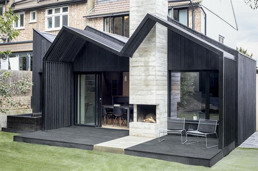 Dark contemporary extension of the London home crafted in wood