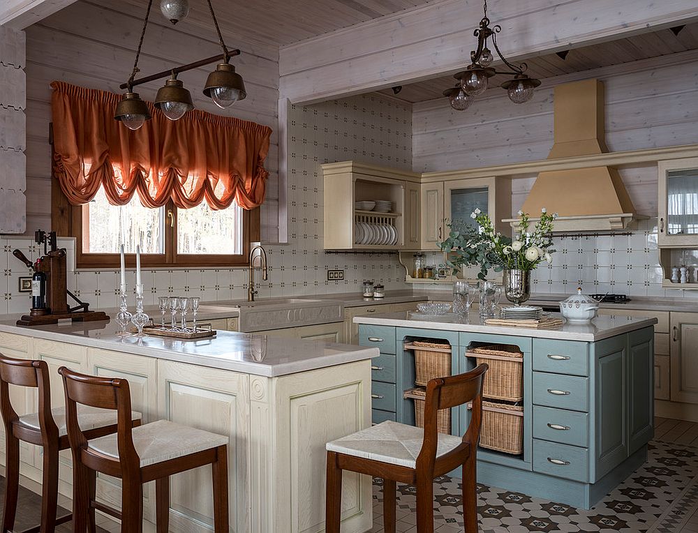 Elegant light blue kitchen island brings color to an otherwise neutral setting