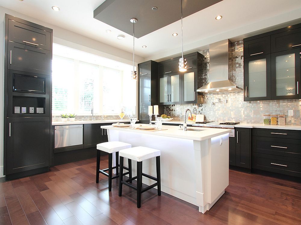 Exquisite metallic backsplash fills the room with light