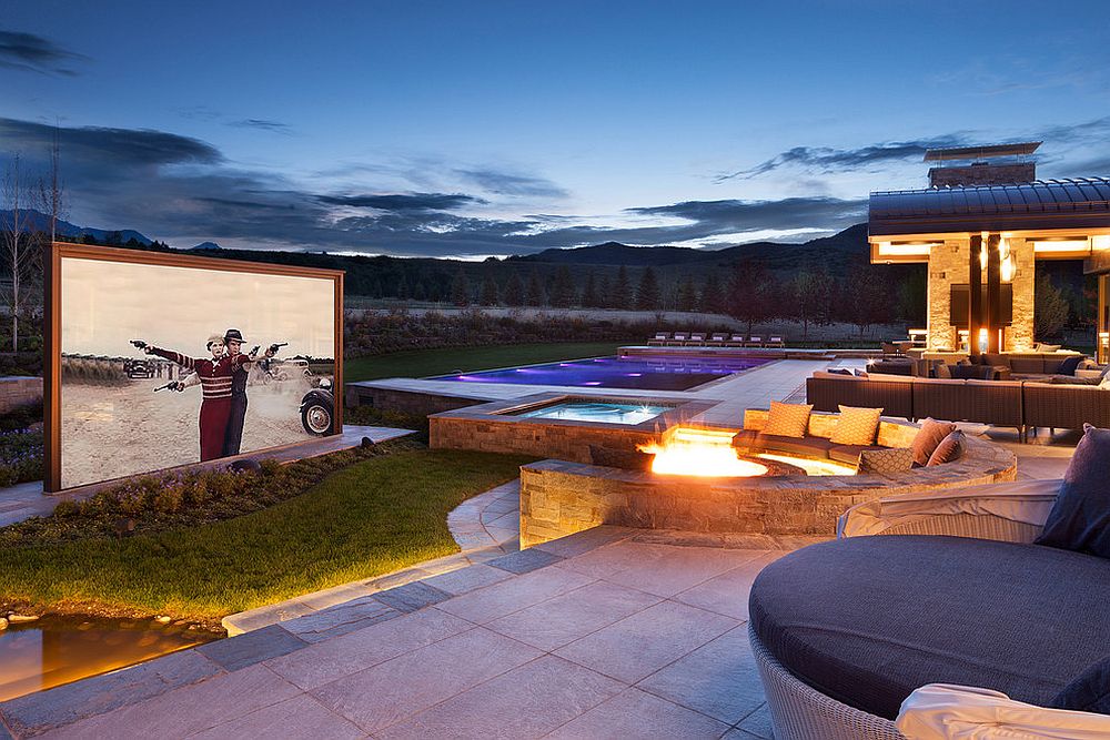 Fabulous modern deck with pool can be transformed into a home theater with ease