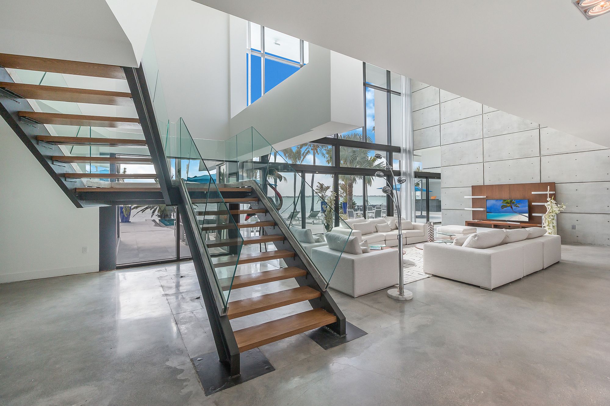 Fabulous staircase connecting different levels of the contemporary Miami home