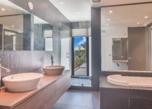 Floating-wooden-vanity-in-the-modern-minimal-bathroom-217x155