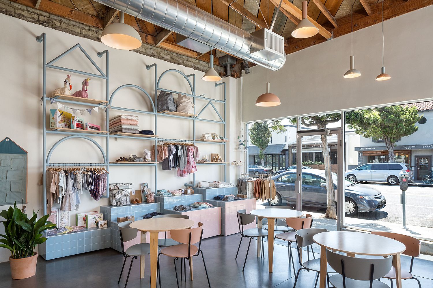 Geometric-metal-and-wood-shelves-along-with-modular-cubes-offer-display-and-storage-space