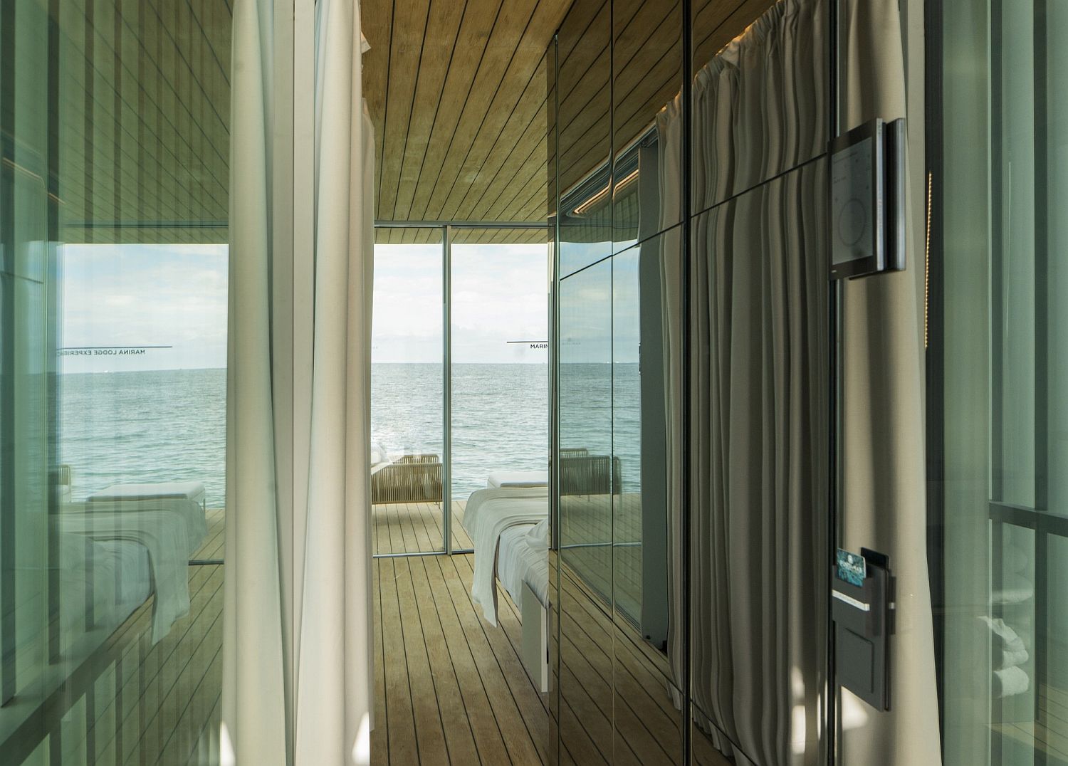 Glass-doors-and-wooden-walls-create-a-smart-and-modern-interior