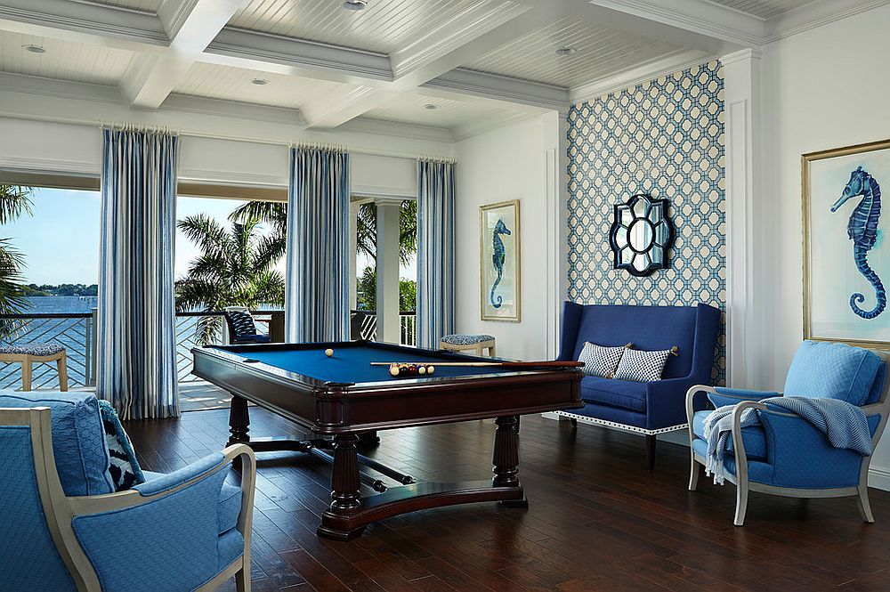 Gorgeous blue and white beach style living room with a view that steals the spotlight