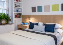 Headboard-and-flooring-brings-woodsy-element-to-this-contemporary-kids-bedroom-in-white-217x155