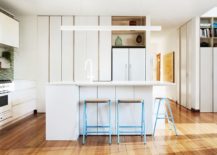 It-is-the-flooring-that-brings-wood-to-this-contemporary-kitchen-in-white-217x155