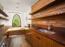 Narrow-and-woodsy-contemporary-kitchen-with-window-seat-at-its-end-217x155