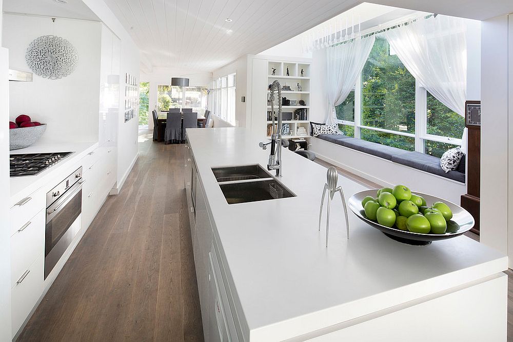 Narrow kitchens with a view are the perfect places for a comfy bay window seat