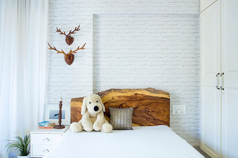 Natural-wood-headboard-adds-warmth-and-elegance-to-this-lovely-kids-room-in-white