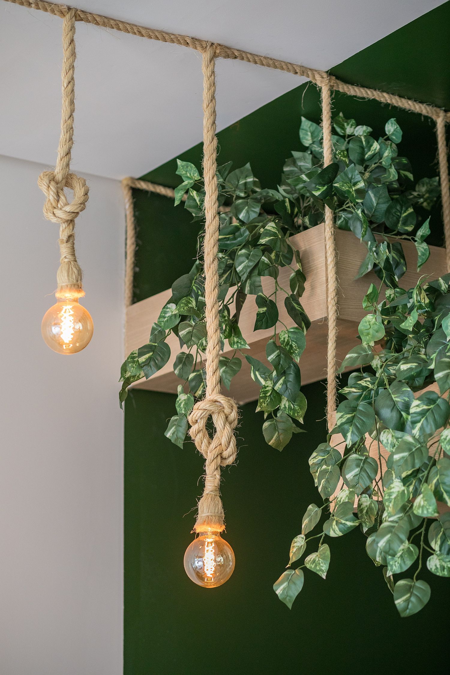 Plants, wood and rope reshape the interior of the cafe