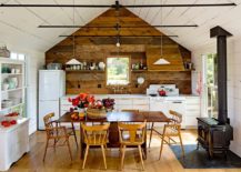 Reclaimed-wood-creates-a-gorgeous-accent-wall-in-the-attic-farmhouse-kitchen-217x155