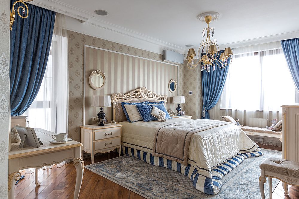 Silken drapes add class and style to the traditional bedroom in neutral hues