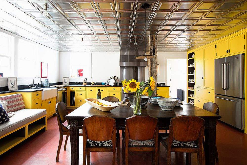 Stunningly colorful kitchen in yellow with a ceiling that also stands out