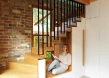 Tiny-reading-and-sitting-nook-under-the-stairway-217x155