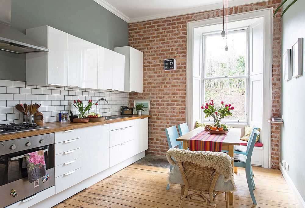 Tiny window seat for the eclectic kitchen with a small dining table