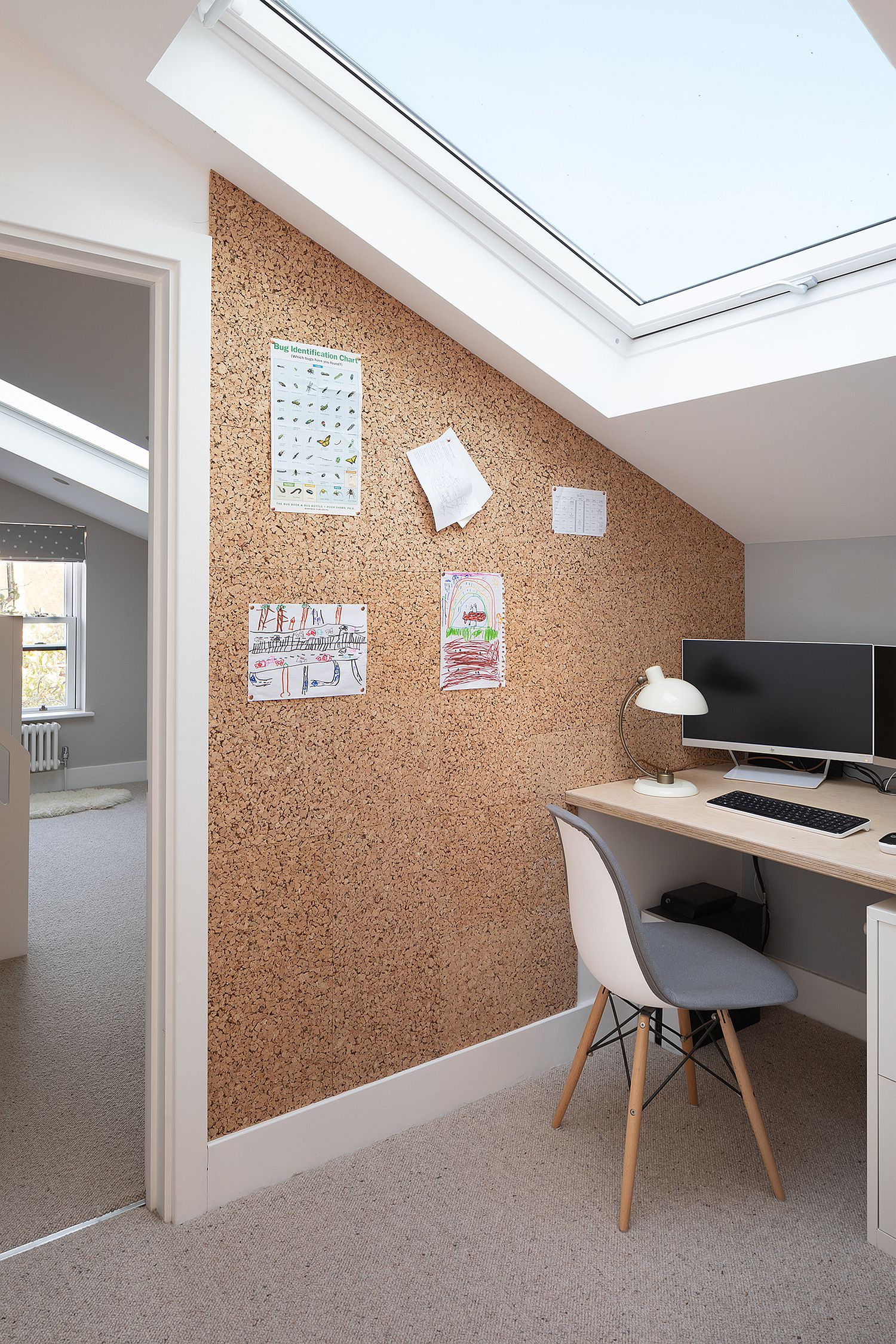 Upper level corner workspace with skylight