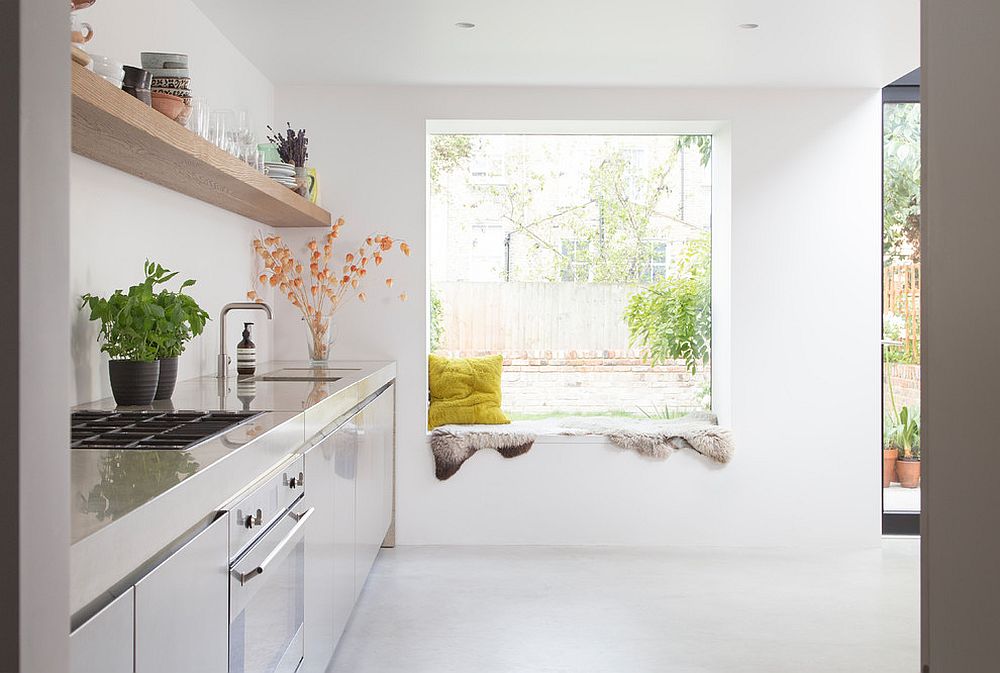 Window seat in the white Scandinavian kitchen that you would hardly notice from a distance