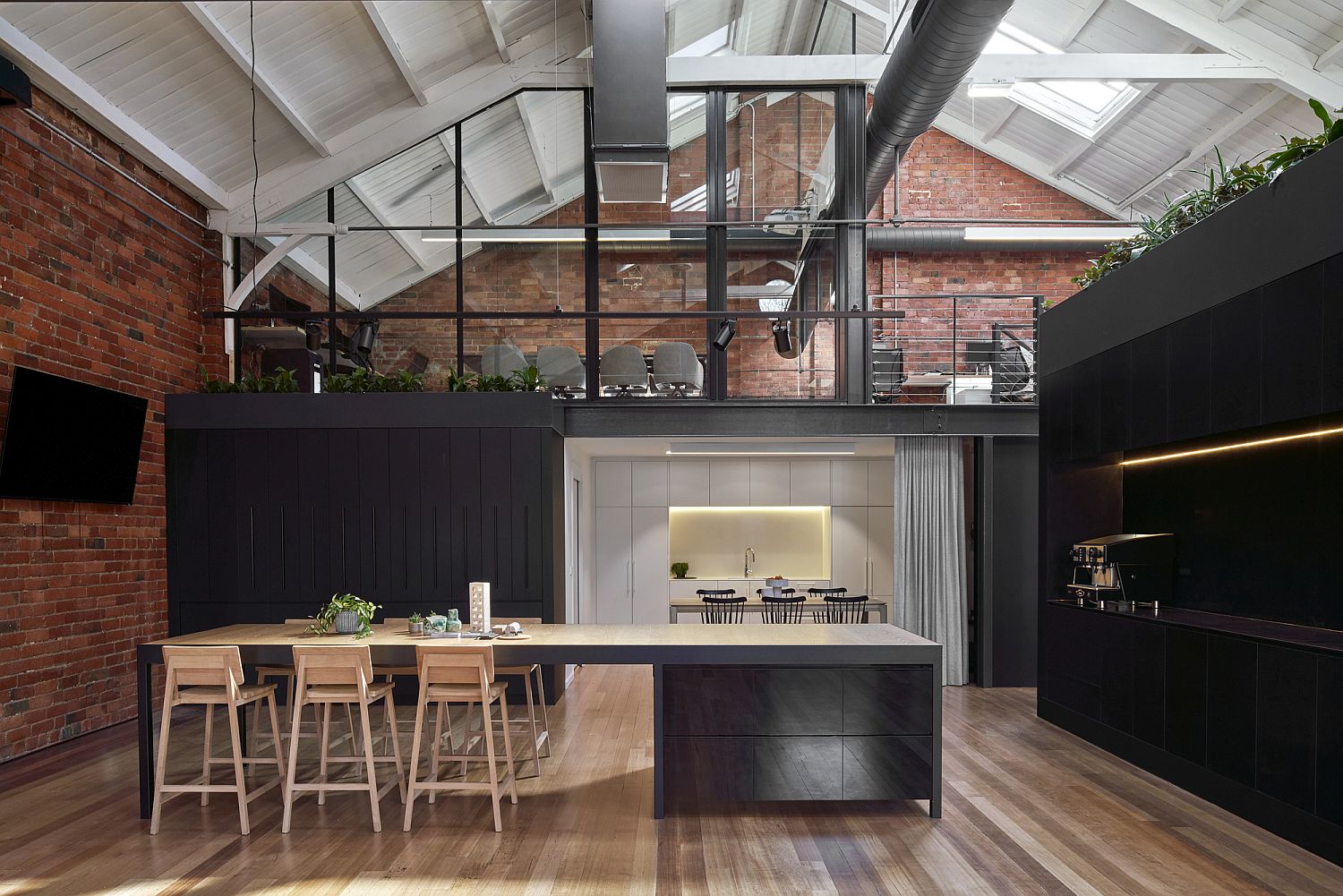 Wood brick and polished modern surfaces find space here