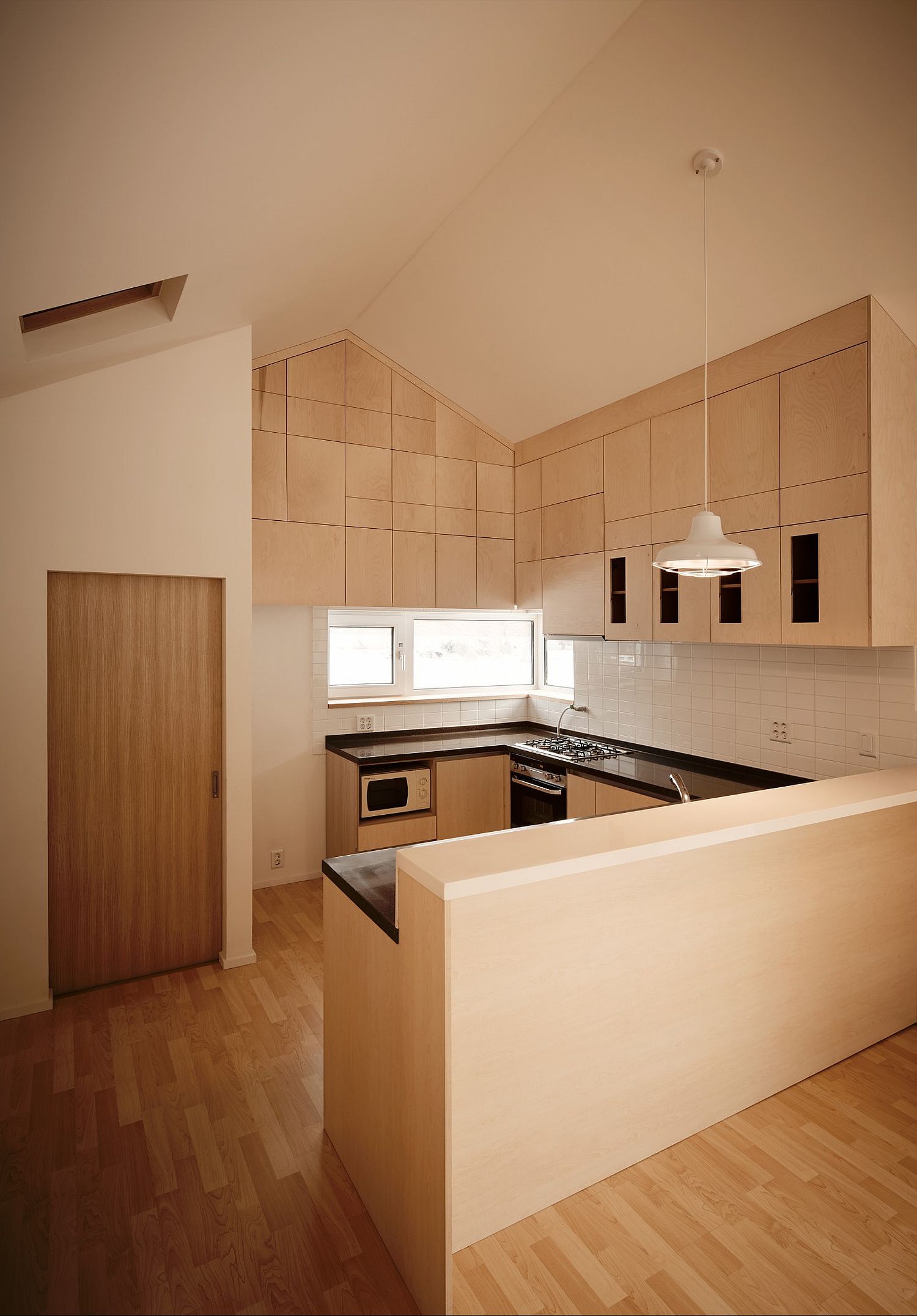Wooden kitchen and interior of the budget South Korean home