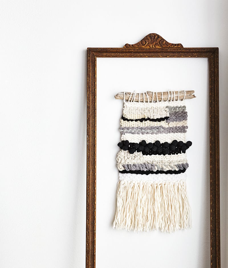 Woven wall hanging with a frame