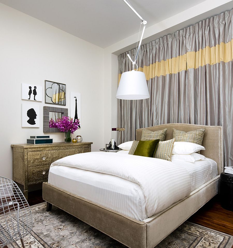 Yellow band on gray drapes brings brightness to the entire bedroom