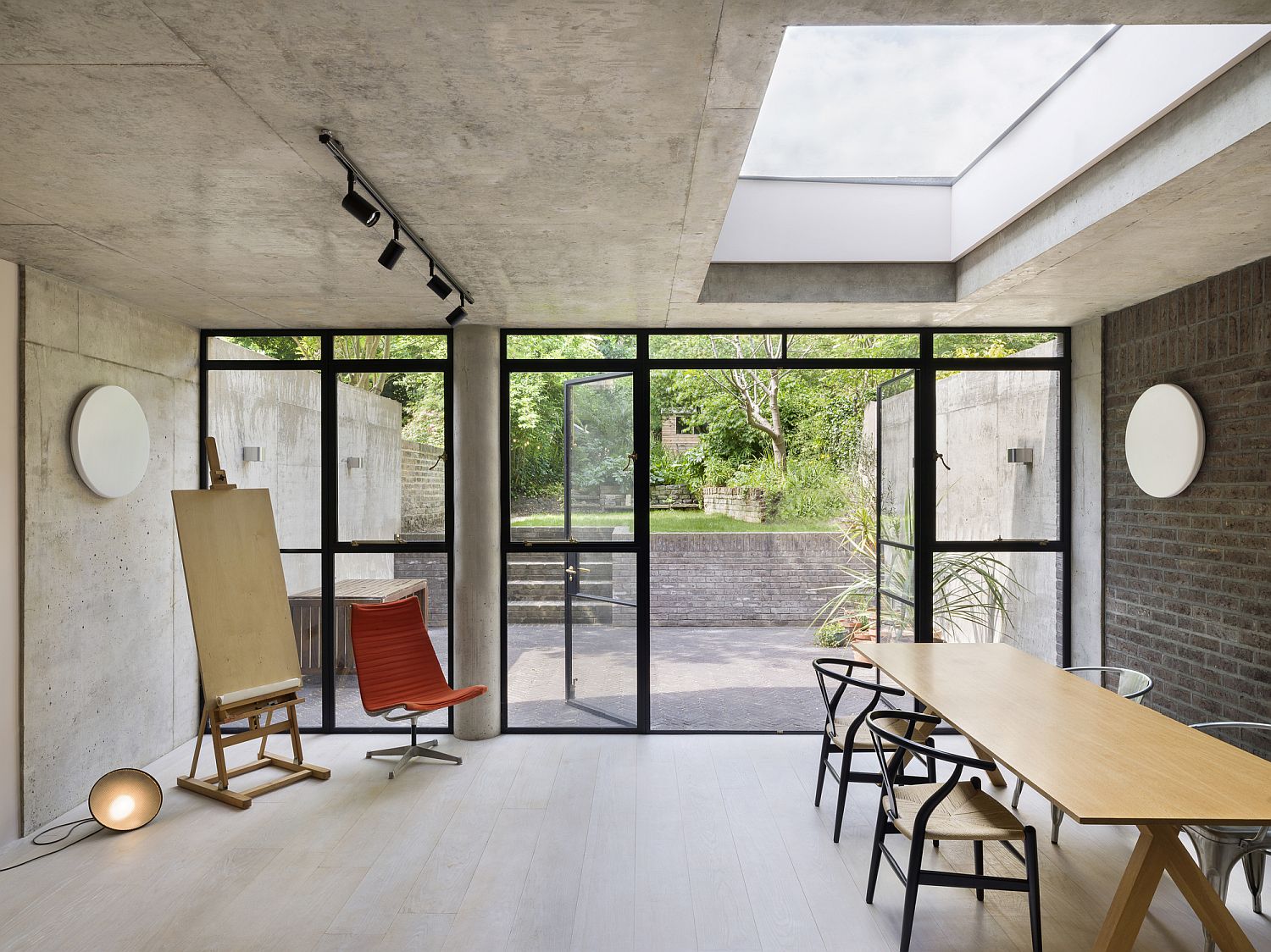 Brick, concrete and glass create a lovely extension for terraced Victorian home