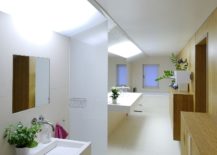 Contemporary-bathroom-design-in-white-and-wood-217x155
