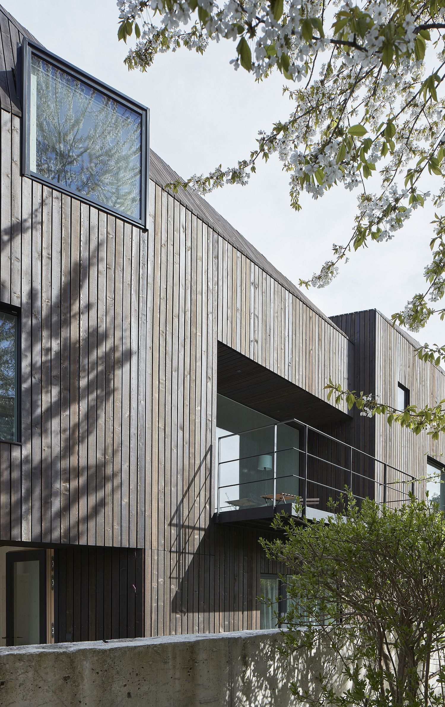 Dark oiled wood exterior of the modern home in Innsbruck