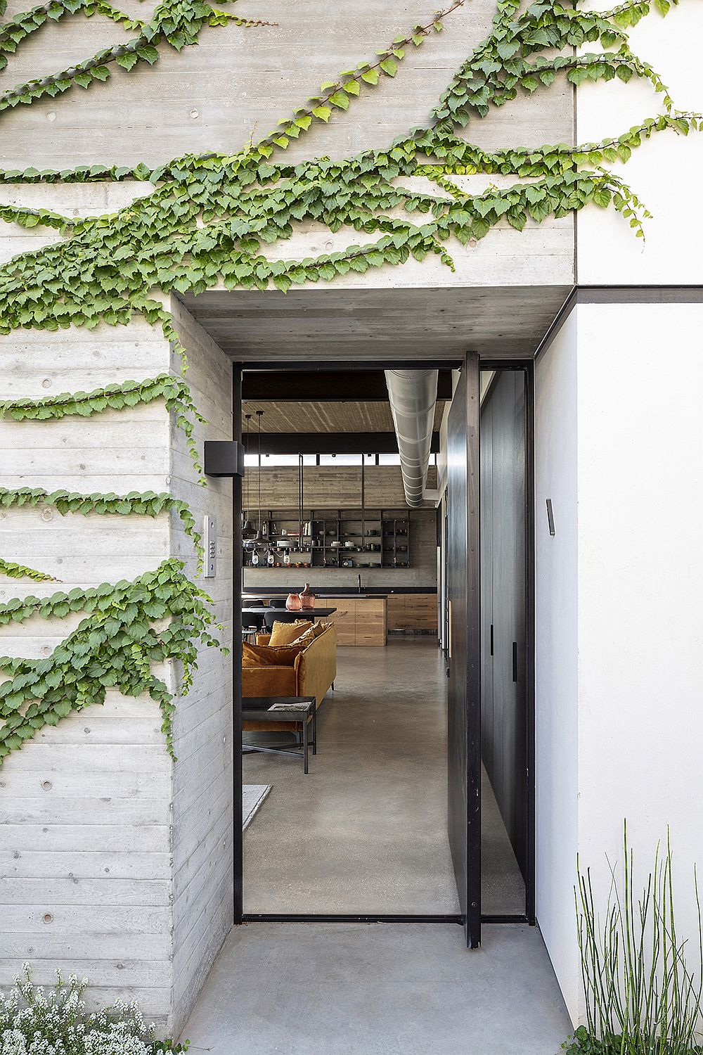 Entry to the home from the street and open landscape sides