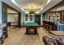 Extensive-and-spacious-basement-redesign-allows-it-to-function-as-bar-game-room-and-hangout-217x155