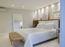 Floor-mirror-gives-the-small-bedroom-a-more-spacious-look-217x155