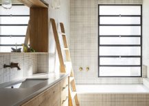 Light-filled-modern-bathroom-in-white-and-wood-217x155