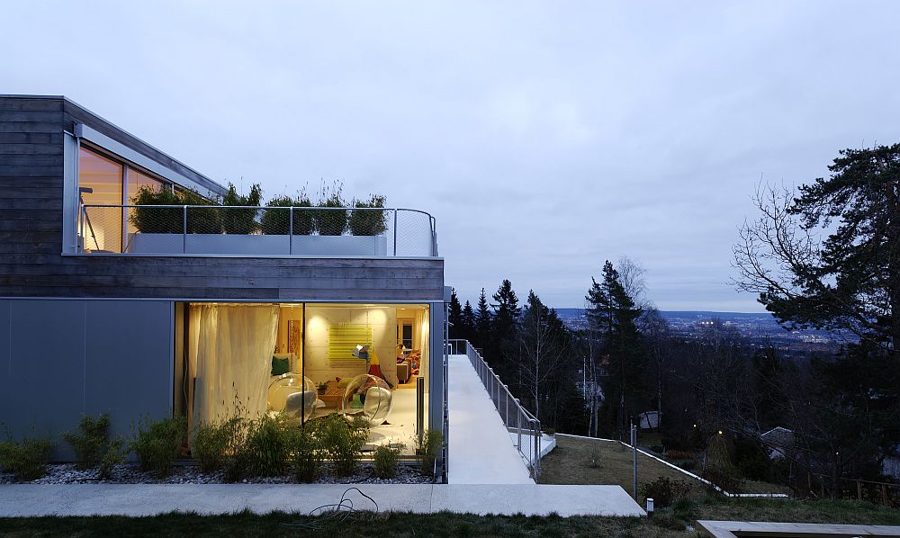 Light wood and concrete exterior of the contemporary home