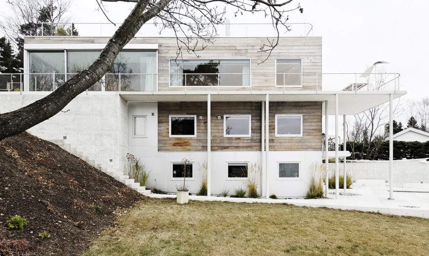 Reconstructed Multi-Level Hillside Home in Oslo Wrapped in Concrete and Wood