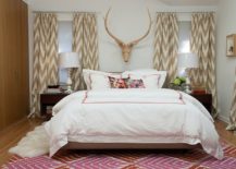 Patterned-rug-and-drapes-instantly-transform-the-bedroom-vibe-217x155
