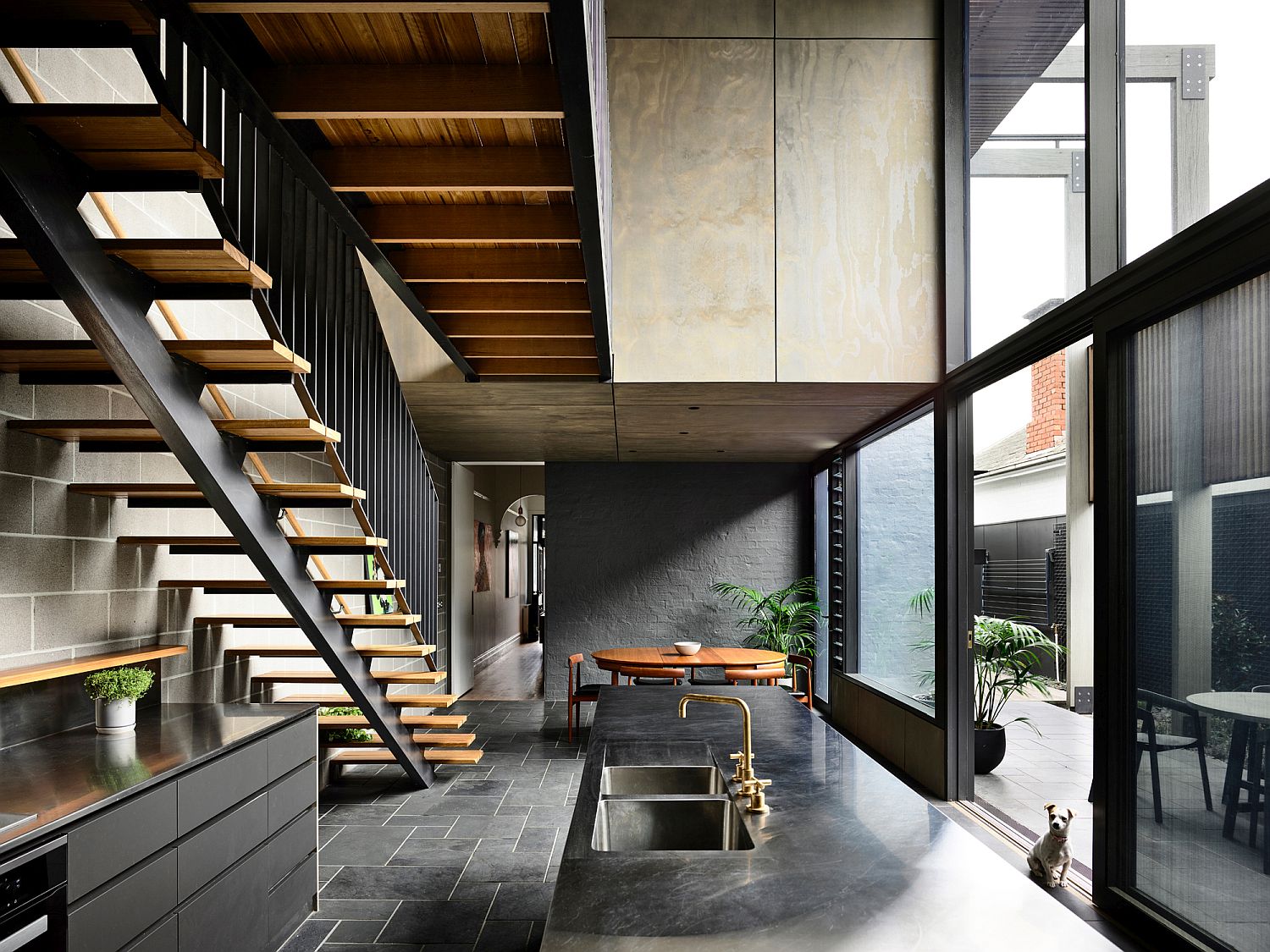 Polished-and-industrial-kitchen-in-black-is-a-showstopper