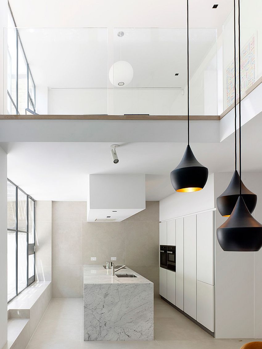 Polished apartment in white with pendants that steal the show